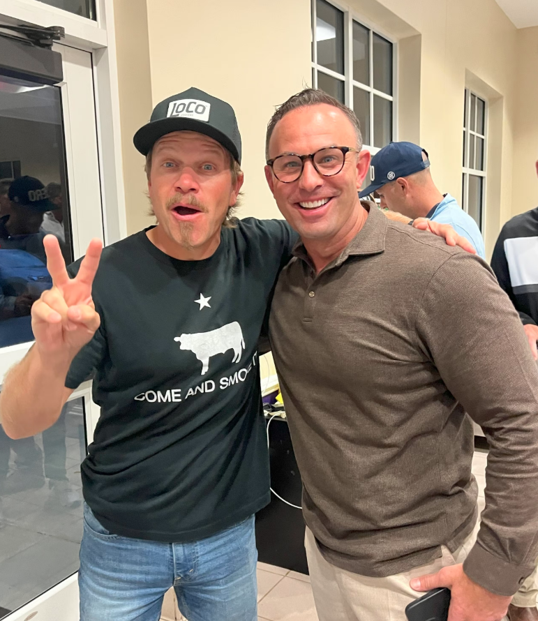 Two KRCS members in fellowship at an event