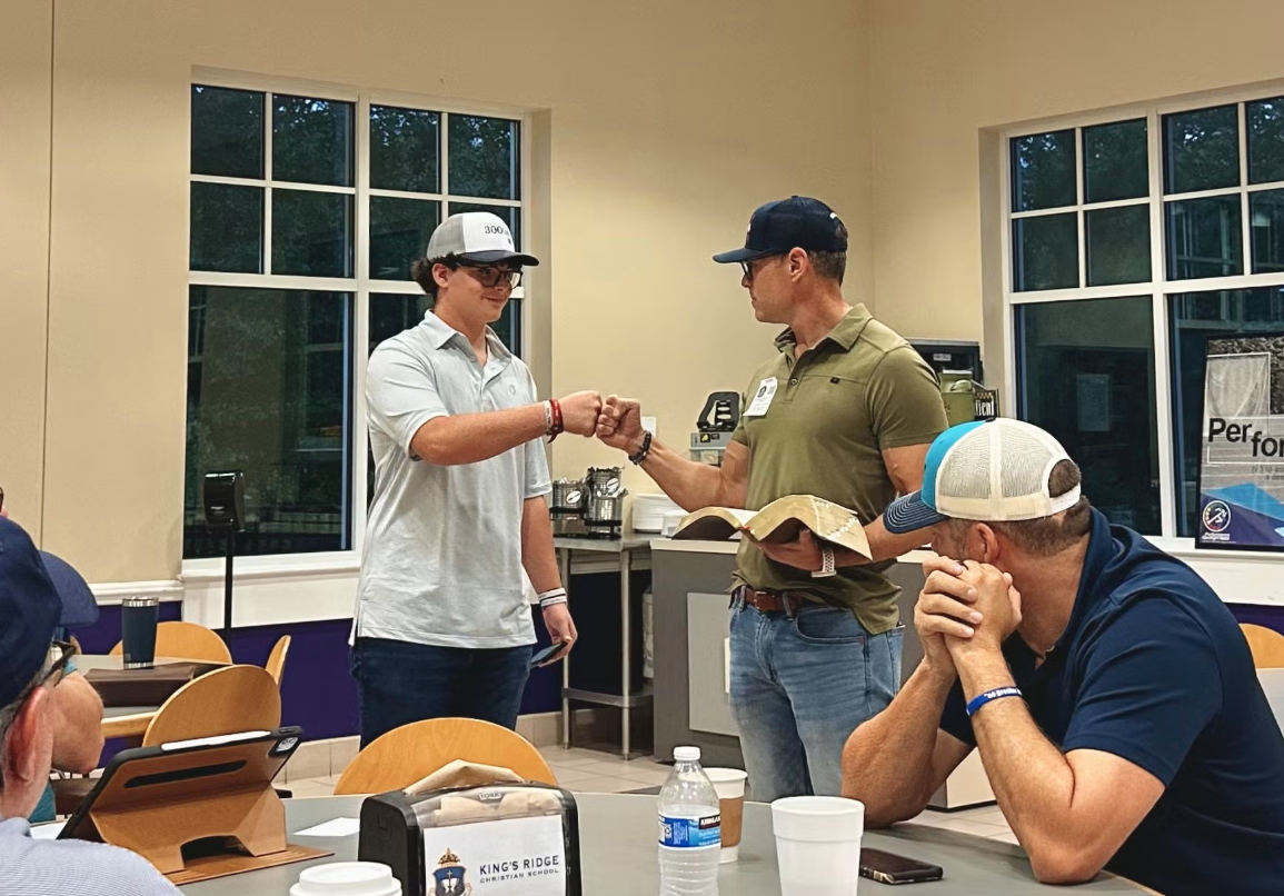 Men studying scripture together